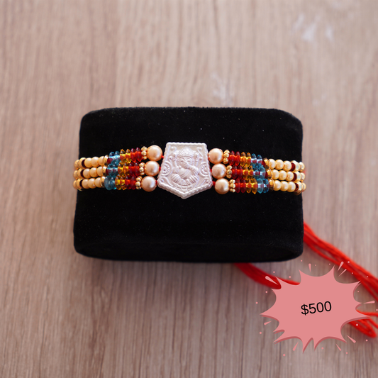 Lucky Ivory Ganesh Rakhi 576