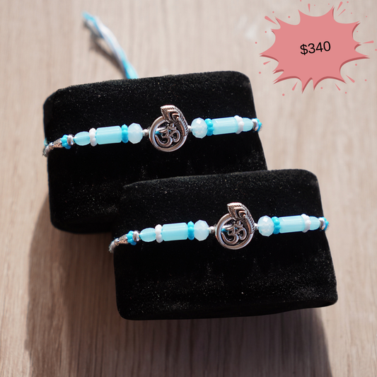 Silver Om Blue Threads Rakhi 841