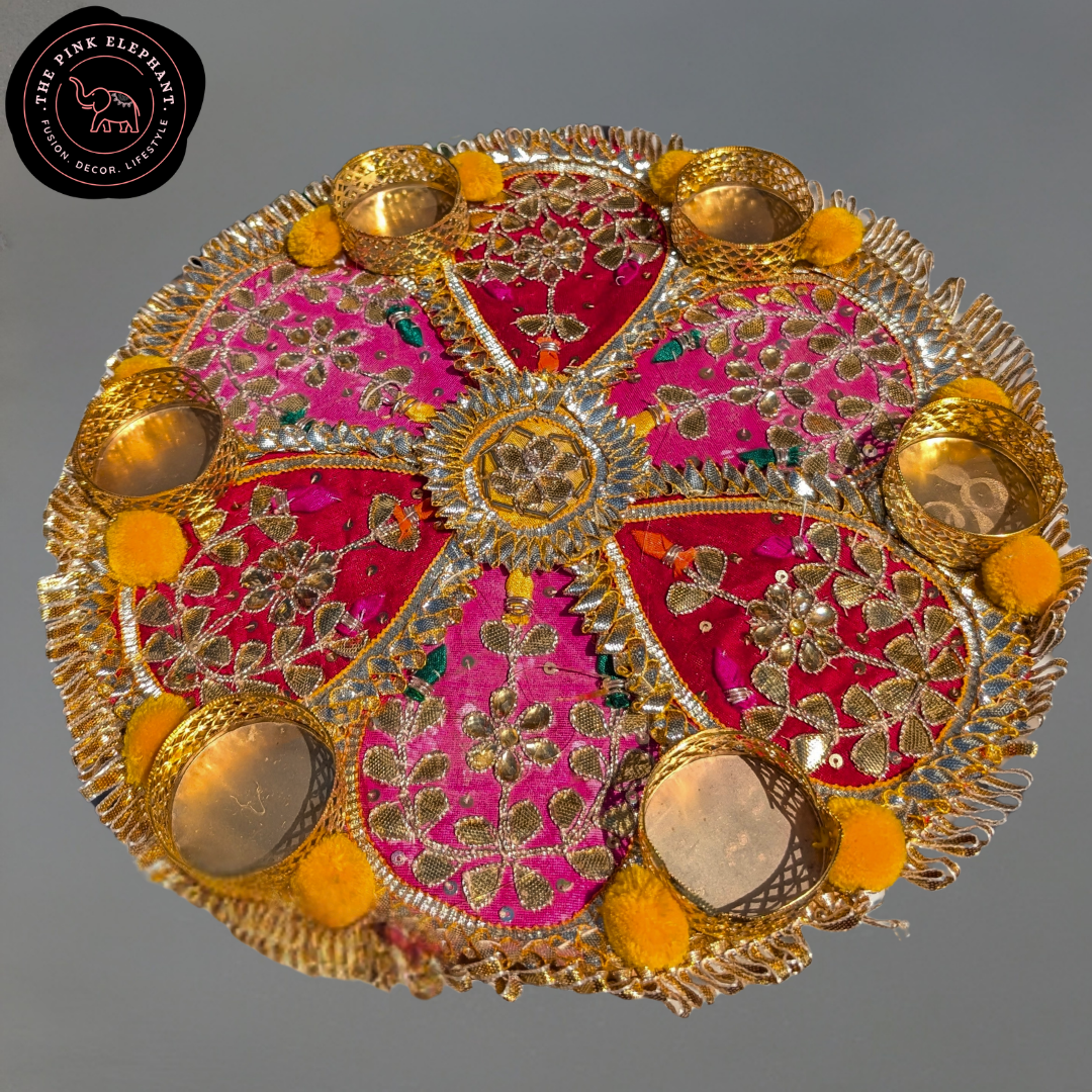 Pink and Orange Flower Rangoli with Tealight Holder