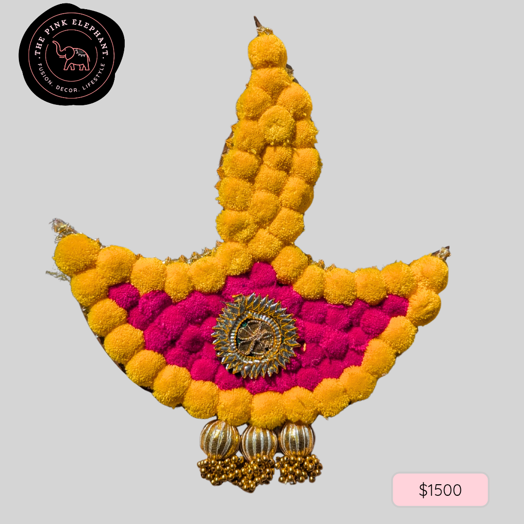 Pink and Yellow Pom Pom Diya Rangoli